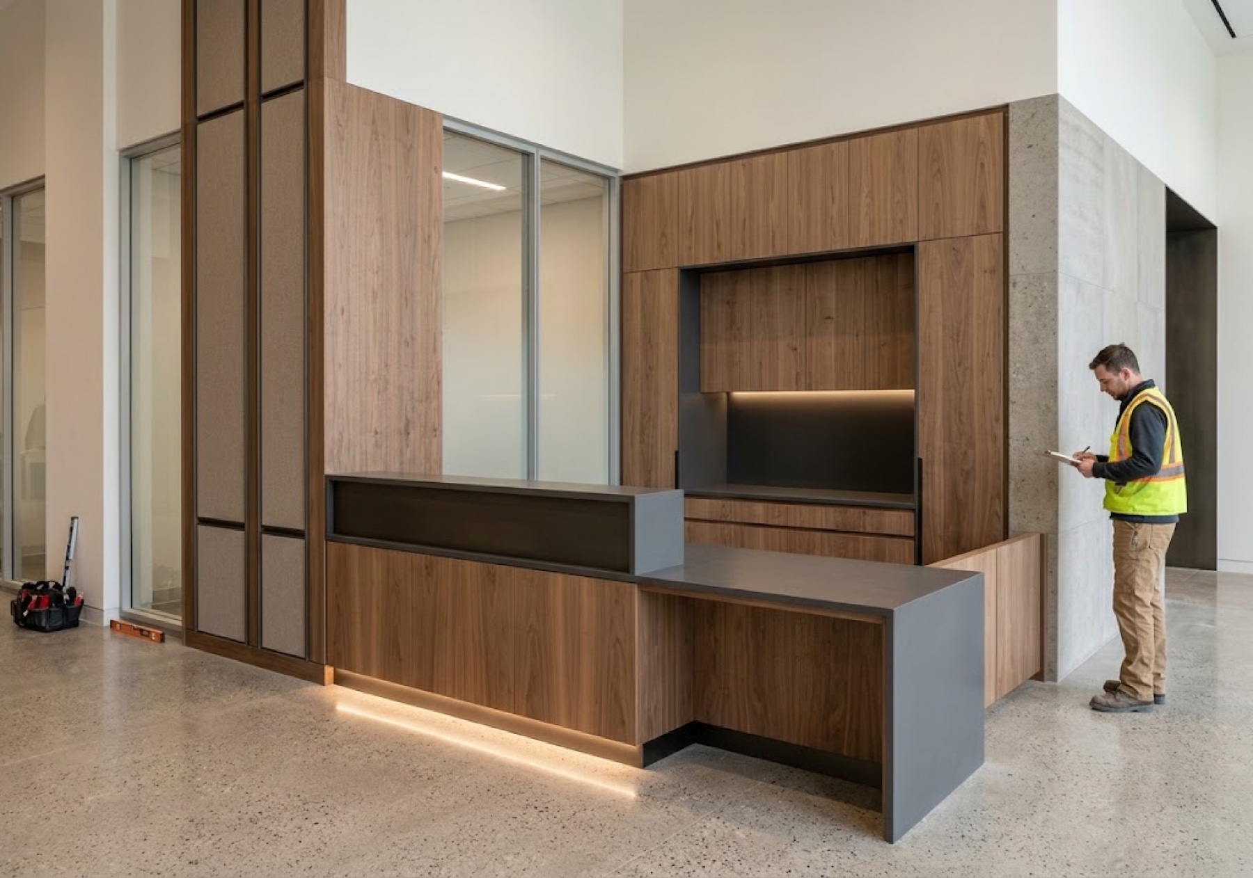 Custom millwork reception desk during final inspection